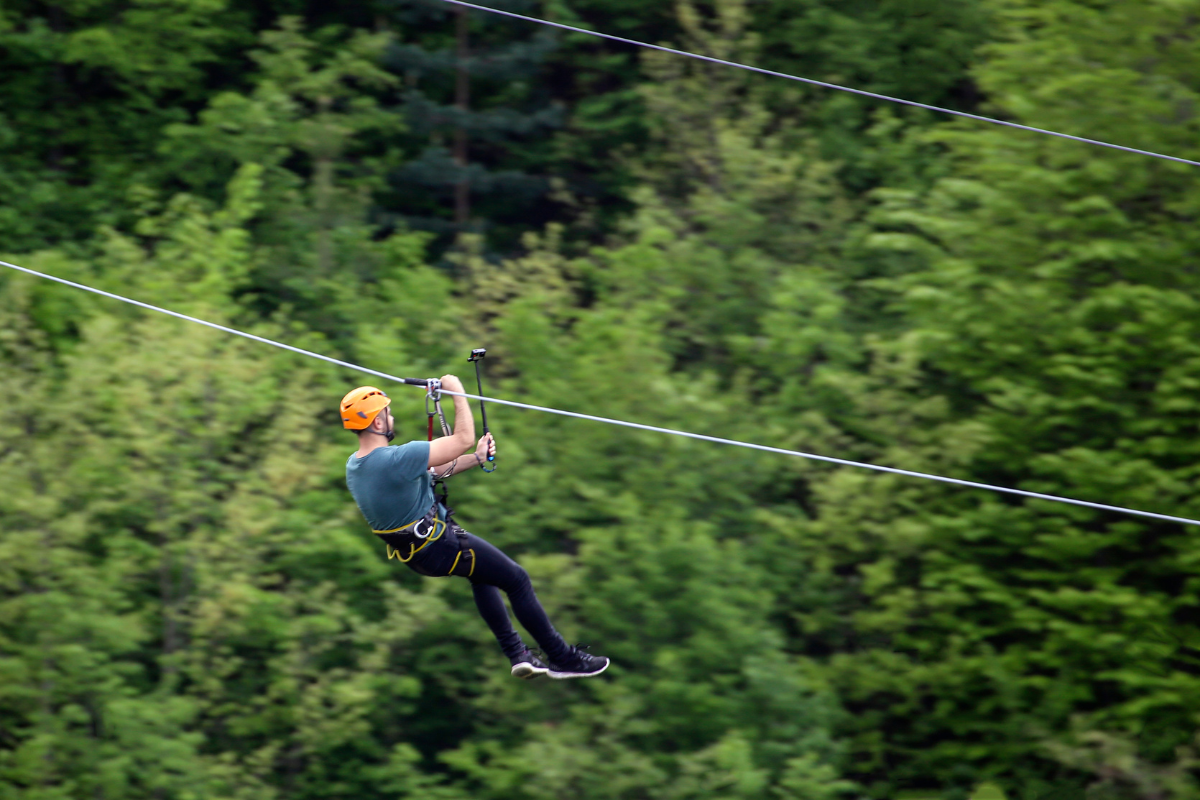 a person flying through the air while riding skis