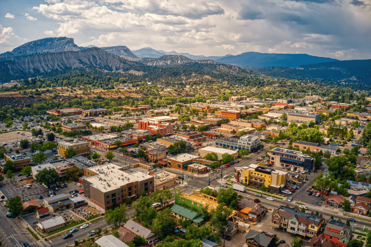 a view of a city with a mountain in the background